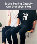 Two people sitting on a wooden shelf attached with Heavy Duty Folding Shelf Brackets Built Legit Durable With Seamless Stainless Steel Wall Mount Table Support Hardware For Space Savvy DIY Setups And Collapsible Floating Shelves.
