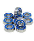 Stack of blue ball bearings set 10 pack 4x10x4 MR104 2RS for RC car and truck, smooth spin, durable performance.