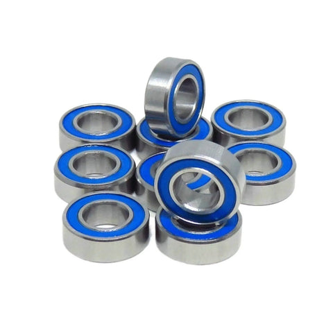 Stack of blue ball bearings set 10 pack 4x10x4 MR104 2RS for RC car and truck, smooth spin, durable performance.