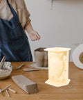Roman Column Balustrade Concrete Mold For Easy DIY Baluster Casting 8.26 By 5.90 By 5.51 Inch Plastic Mold on a table