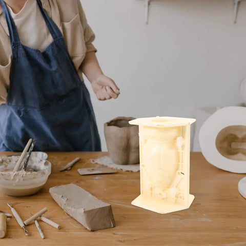 Roman Column Balustrade Concrete Mold For Easy DIY Baluster Casting 8.26 By 5.90 By 5.51 Inch Plastic Mold on a table