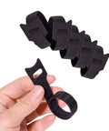 Hand holding black Six Inch Reusable Fabric Cable Ties With Hook And Loop 100 Pack Multi Color Cable Organizer Straps For Cord Management