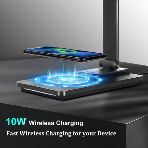Go-To Smart Desk Lamp With 10W Wireless Charger And USB Port For Home Office And Study showing phone on charging pad