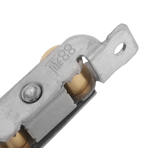 Close-up of Heavy Duty Sliding Glass Door Rollers 2 Piece Set Featuring Double Wheel Bearings for smooth operation, showing metal and brass components.