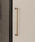 10 Inch Cabinet Bar Pulls With Antique Brass Finish 256mm Hole Centers Set Of 2 for cabinets, shown on a beige cupboard door.