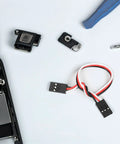RC electronics setup with 10 Pack 15cm RC Extension Cables 3 Pin Female To Female Wire for airplane, car, and helicopter use.