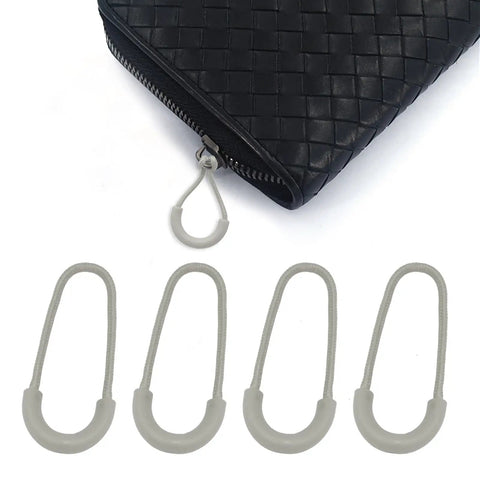 10 Pack Heavy Duty U Shape Zipper Pulls For Backpacks Luggage And Clothes With Nylon Rubber Grip 3Mm Cord Replacement Zips In Gray For Smooth Fast Access shown with bag.