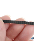 184 Tooth Timing Belt With Closed Loop Pulley Gear Cogged Rubber Drive Belt 14.7 Inch Length 0.125 Inch Wide Fiberglass Cord Reinforced close-up held by fingers
