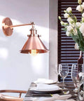 Heavy Duty Adjustable Wall Sconce Featuring Straight Up Industrial Design Foolproof Mounting E27 Base Solid Bronze Glow in copper finish.
