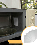 Five Pack Waveguide Covers For Microwave Mica Sheets 150 X 120mm installed in microwave oven, showing fresh installation site