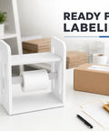 Premium Solid Wood Label Holder In Clean White, No Sweat Setup Printer Stand And Sticker Dispenser For Thermal Rolls And 4X6 Shipping Labels, ready for labeling on a desk.