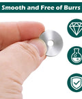 Close-up of hand holding Bulk 400 Piece Zinc Plated Carbon Steel Flat Washer, 4mm ID x 20mm OD x 1mm thick, for screws and bolts.