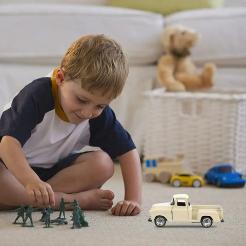 Child playing with small off road pickup truck model toy figure for kids and collectors, realistic 4.92 inch mini car on floor