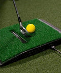 Game Ready Indoor Golf Simulator Kit With Net And Mat For Home Setup showing club hitting foam ball on mat with USB cable