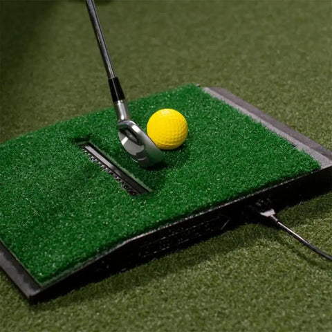 Game Ready Indoor Golf Simulator Kit With Net And Mat For Home Setup showing club hitting foam ball on mat with USB cable