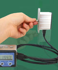 Top Tier Digital Angle Gauge With Slick Rotating Shaft And Bullseye Zero Point One Degree Resolution featuring metal base and digital display.