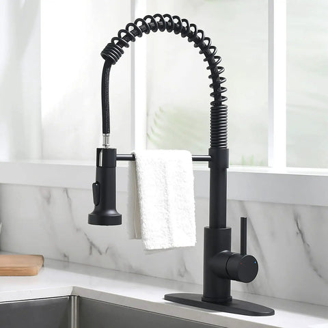 Black RV Kitchen Faucet With Pull Down Sprayer For RV Kitchen Sink, 3 Way Spray Settings Stream Spray Pause, 1.8 GPM, in kitchen setting.