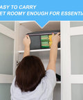Person storing 35L Foldable Storage Bags Six Pack With Clear Window And Sturdy Handles for clothes in a white closet