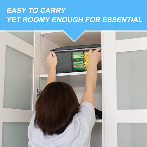 Person storing 35L Foldable Storage Bags Six Pack With Clear Window And Sturdy Handles for clothes in a white closet