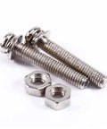 Close-up of metal bolts and nuts on a white background