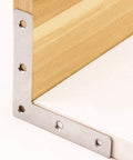 12 Pack Stainless Steel L Shaped Corner Brackets Rock Solid Right Angle Furniture Repair Plates Heavy Duty Table Leg Supports With Screws, installed on wooden corner.