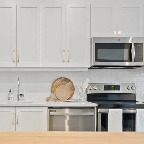Sweet 10 Pack 5 Inch Brushed Brass Kitchen Cabinet Handles Gold Toned Drawer Pulls Featuring Smooth Edges For Cupboards And Home Cabinetry Upgrades 128mm Easy Mount on white cabinets.