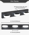 Size display of matte black vanity lights over mirror three light modern bathroom fixture with rotatable oval lampshades.