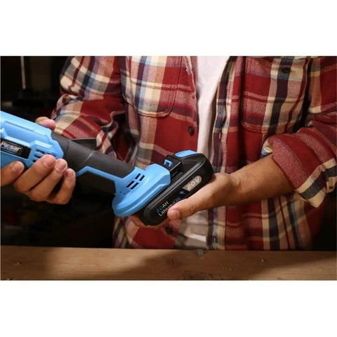 20V Lithium Ion Cordless Angle Grinder Built Like A Tank With An Adjustable Side Handle For Tough Cutting And Grinding Jobs Totally Wire Free So You Can Cruise Through Any Project Without Breaking A Sweat Or Dealing With Snags held in hand with a battery pack attached.