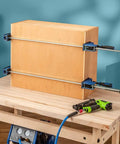 Beefy 24-Inch Parallel Bar Clamps For Woodworking, Adjustable Heavy Duty Clamps holding a wooden box on a workbench