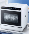 Quick Turnaround Countertop Dishwasher With Four Efficient Wash Settings And Full Coverage Spray For Fast Cleanup Super Sleek Design Smooth Rental Living No Sweat, showing sleek white design and clean plates.