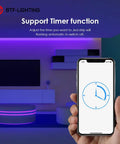 Person holding smartphone showing timer for 8 Channel Bluetooth LED Controller With Built In Mic And Aux Music SP608E in illuminated room