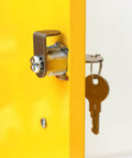 Close-up of lock mechanism and keys on yellow Lockout Tagout Cabinet Kit For Padlocks, highlighting secure storage features.