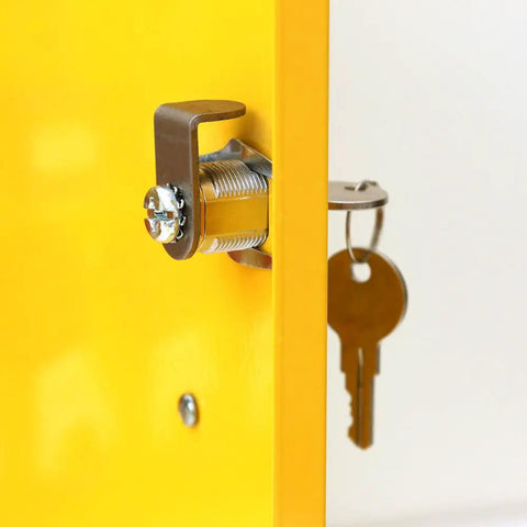 Close-up of lock mechanism and keys on yellow Lockout Tagout Cabinet Kit For Padlocks, highlighting secure storage features.