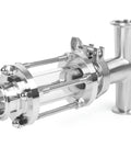 Side view of stainless steel inline sight glass with 1.5 in tri-clamp ends, bolted clamps, 38 mm OD