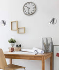 Office setting with Matte White Adjustable Spotlight Wall Sconce With Integrated LED Bulb, flush mount on white wall