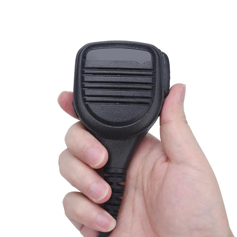 Hand holding a Hands Free Two Way Pro Grade Radio Shoulder Microphone For Hytera Walkie Talkie With IP54 Water Resistant Clip On Mic