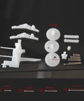 Mini Ornithopter Shaft With Ornithopter Mechanism Kit Components for Reliable Power Transmission, white plastic gears on black surface