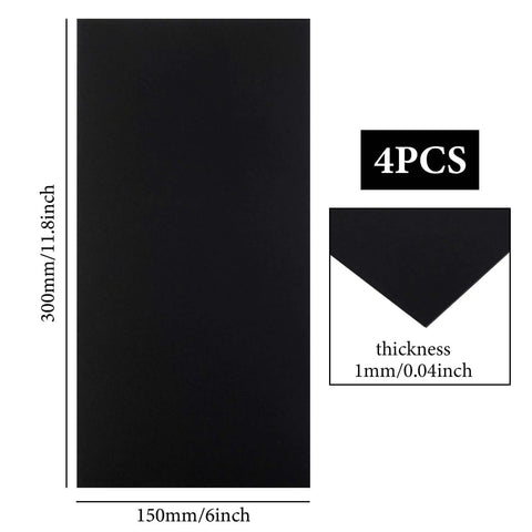 Front view: four black anodized aluminum sheets, 6 x 12 in, 1 mm thick, for laser engraving.