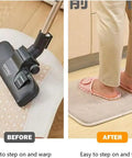 Image showing vacuum on rug in 'before' and person standing on flat rug in 'after' with non slip rug pad grippers for hardwood and tile.