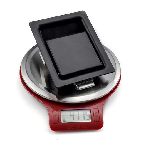 Visible Push To Close Latch For Cabinets, Pull To Open, Same Plane Lock Panel, Model 64 10 302 90, on red digital scale