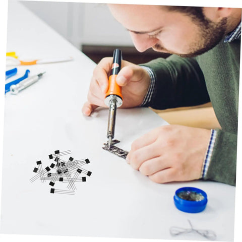 Person soldering components with soldering iron, showcasing Built Tough 20 Piece Hall Effect Sensor Kit With Bipolar Latching Linear Sensor For Heavy Duty Industrial Automation And Automotive Diagnostics Easy As Pie Dead Nuts Precise Magnetic Switches.