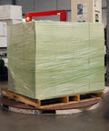Heavy Duty Green Tint Pre Stretched Stretch Wrap Film 15 By 1476 Feet 30 Gauge 4 Roll Pack securing boxes on a wooden pallet.