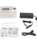 Quick Chill Portable Ice Cube Maker For Home Or Car, includes power adapters and instruction manual, compact white design.