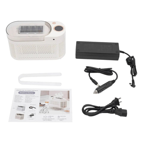 Quick Chill Portable Ice Cube Maker For Home Or Car, includes power adapters and instruction manual, compact white design.