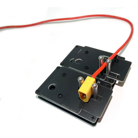 RC Soldering Station Jig holding XT60 connector with silicone wire, stable base for DIY RC projects, supports 0-24 AWG wiring.