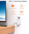 2 Pack European Travel Plug Adapter With 3 Outlets And 3 USB Ports, 2 USB-C, in use on a wall socket with devices charging