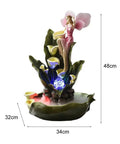 Fairy fountain with pink figurine, green lily leaves, LED light, 48cm tall and 34cm wide