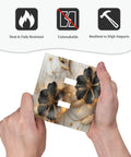 Person holding Ultra Sharp Vintage Black Gold Floral Marble Light Switch Cover Made From Heavy Duty Abs Plastic for double toggle.