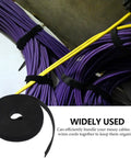 Heavy Duty Reusable Wire Tie Straps For Slick Cable Management Black Self Adhesive Cord Wraps bundling purple cables.