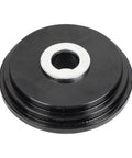 Close-up of a black metal plate from the Front Wheel Drive Bearing Adapters Puller Set 23 Piece Replacement Wheel Bearing Removal Tool Bushing Driver Kit
